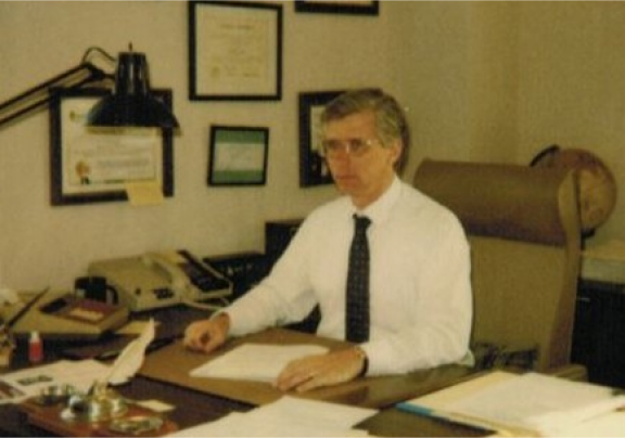 Paul F. Hlubb Jr. at his desk, 1971